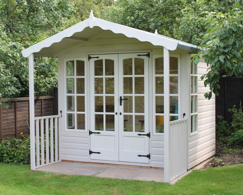 8ft x 6ft (2.4m x 1.8m) with 3ft (0.9m) veranda in painted finish